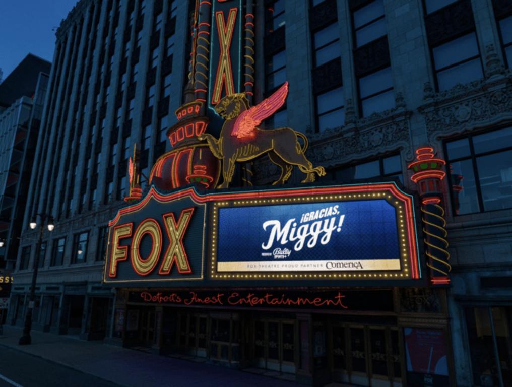 Outside of Fox Theatre at night with blue Miggy sign on marquee. Celebrating Miguel Cabrera Career