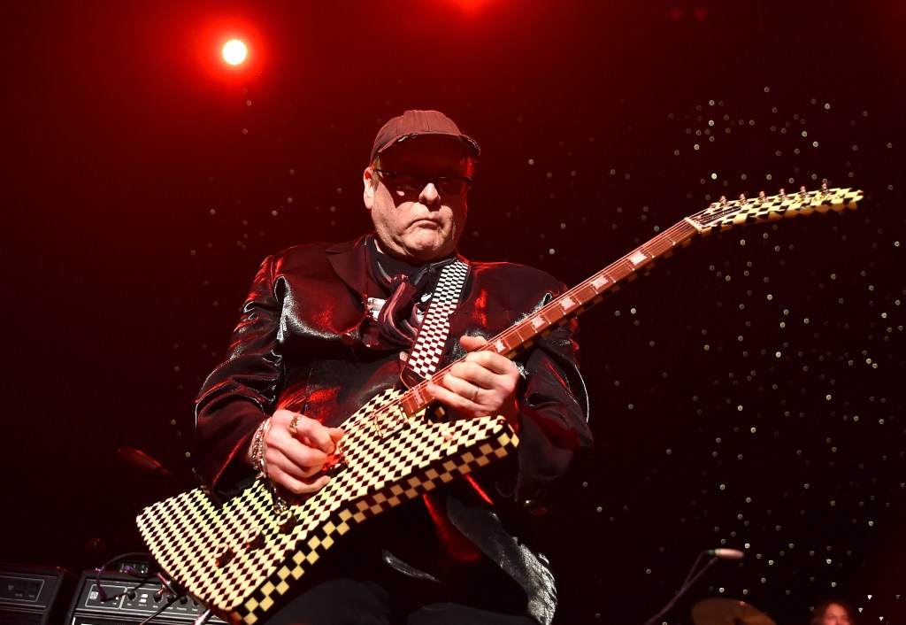 Rick Nielsen of Cheap Trick performs onstage at One More For The Fans! - Celebrating the Songs & Music of Lynyrd Skynyrd at The Fox Theatre on November 12, 2014 in Atlanta, Georgia. Rick is playing the Cheap Trick Guitar that will be featured in front of the Hard Rock Casino in Rockford, Illinois.