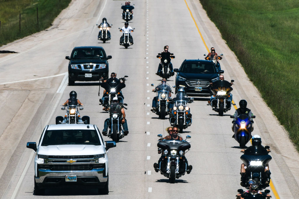 Bike Rally riding on a local freeway with other cars