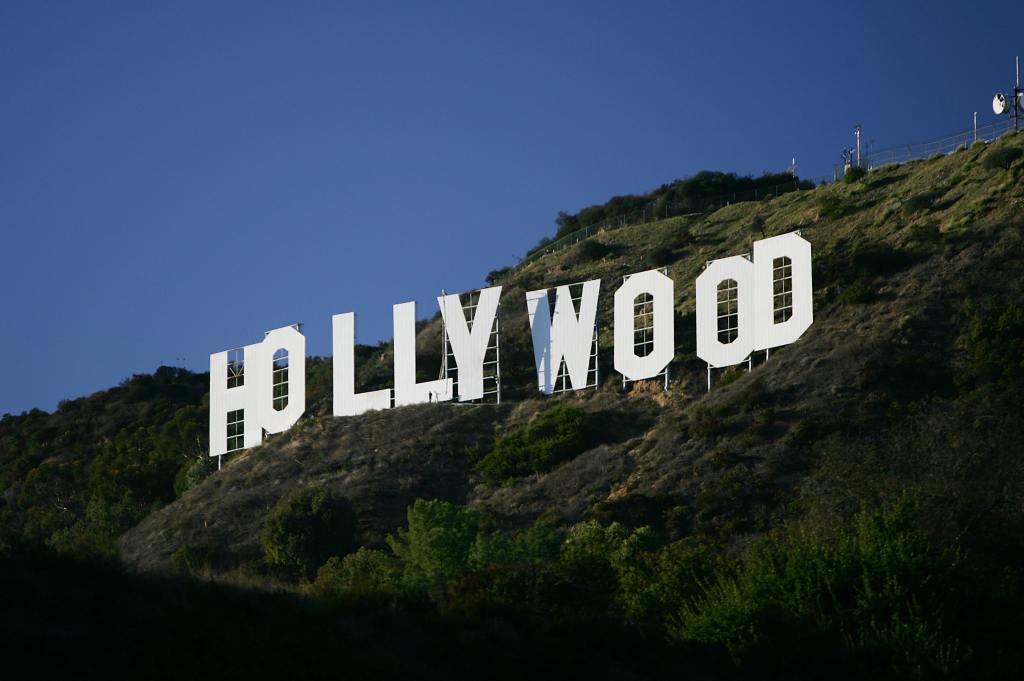 The Hollywood sign in California The Hollywood Sign is seen on November 16, 2005 in Los Angeles, California. The historic landmark erected in 1923 as a giant ad for a housing development and originally read "Hollywoodland", the sign with letters that are 45 feet tall and 36 feet wide