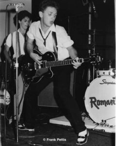 Black and white photo from 1977 of the rock band, The Romantics on stage. 