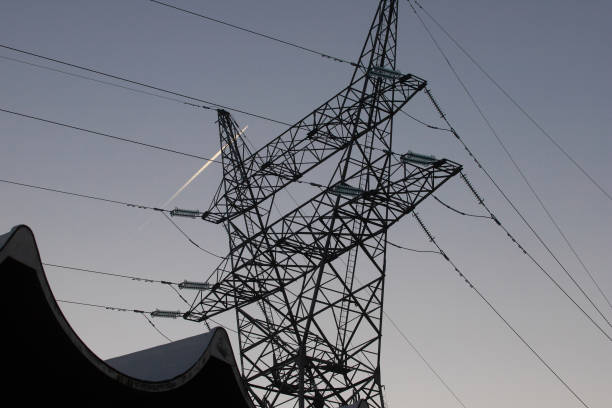 Power Line at sunset as the sky turns dark