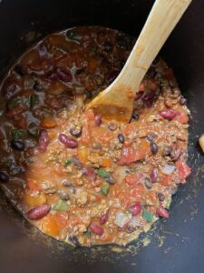 Stir and simmer chili for 30 minutes.