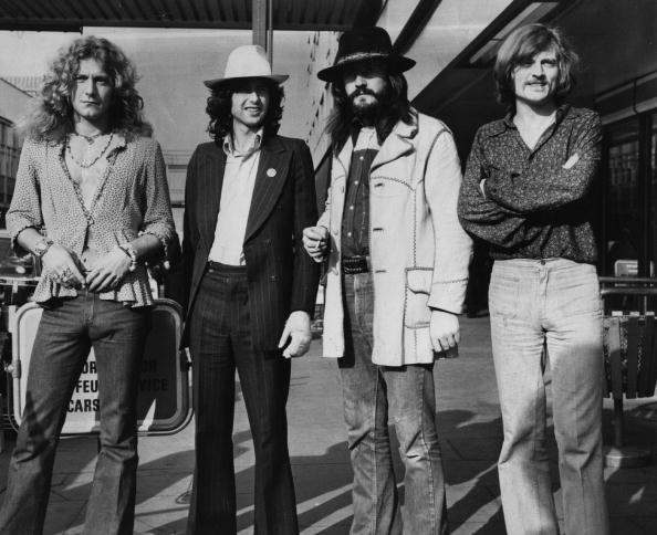 Led Zeppelin band members in a black and white photograph 