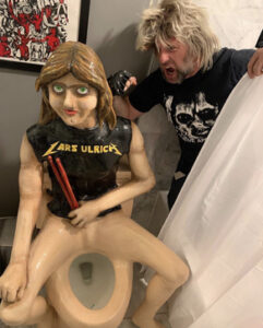 lars Ulrich toilet with man sticking out of shower in the bathroom