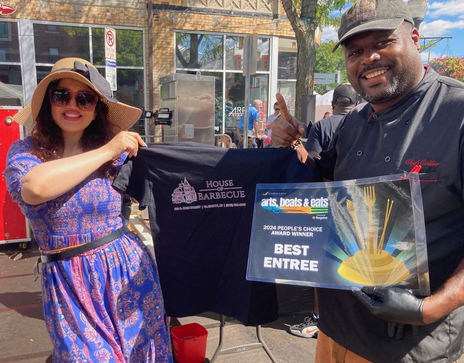 The winners of the 2024 People's Choice Award at Soaring Eagles' Arts Beats and EAtsholding up their award certificate for best entree (BBQ).