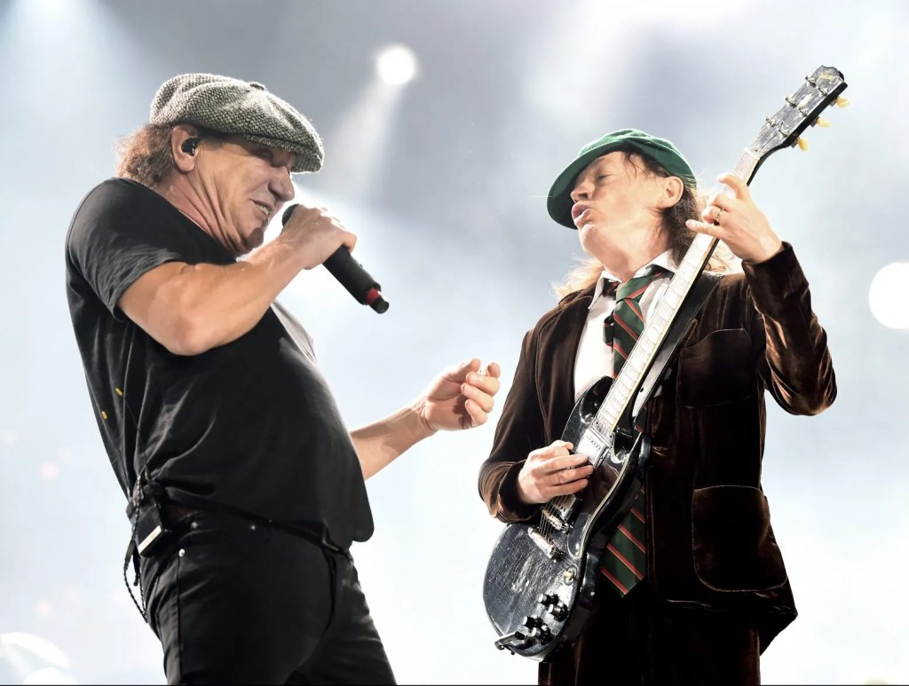 Brian Johnson (L) and musician Angus Young of AC/DC perform at Dodger Stadium on September 28, 2015 in Los Angeles, California.